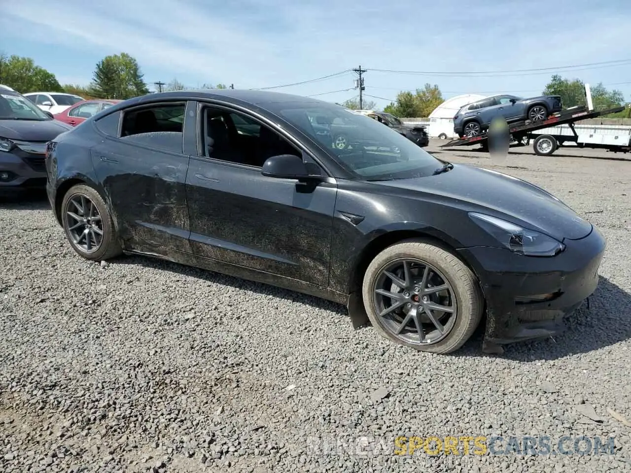 4 Photograph of a damaged car 5YJ3E1EB7NF177197 TESLA MODEL 3 2022