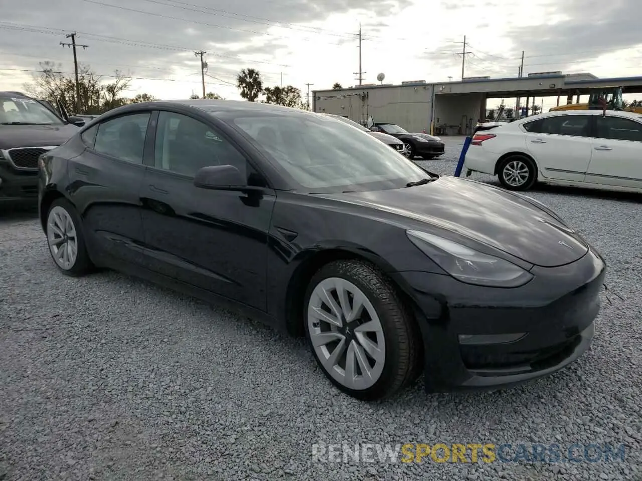 4 Photograph of a damaged car 5YJ3E1EB7NF187938 TESLA MODEL 3 2022