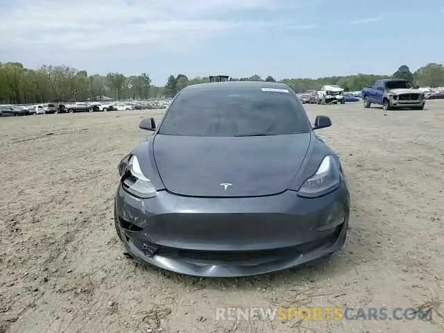 11 Photograph of a damaged car 5YJ3E1EB7NF198115 TESLA MODEL 3 2022
