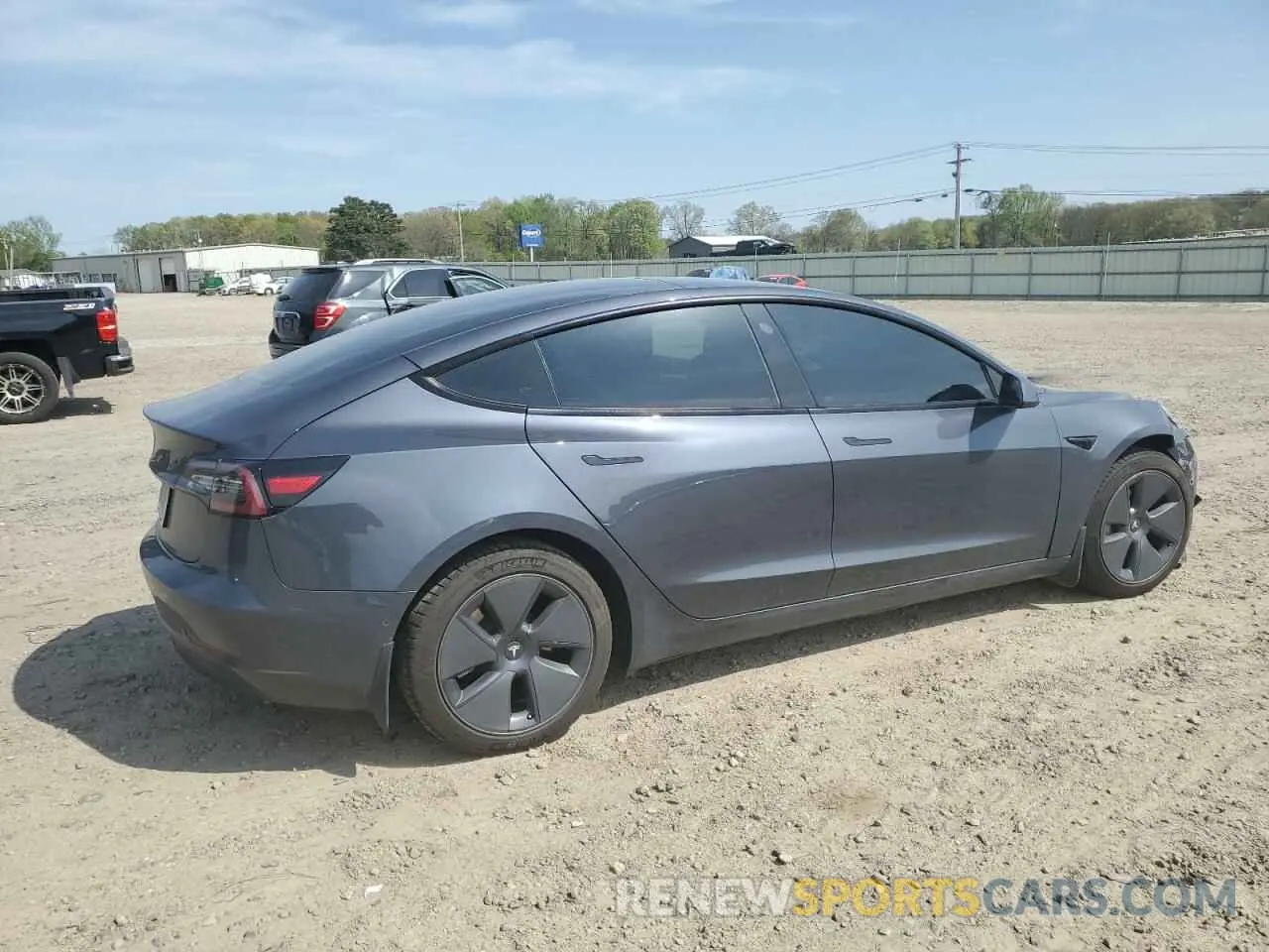 3 Photograph of a damaged car 5YJ3E1EB7NF198115 TESLA MODEL 3 2022