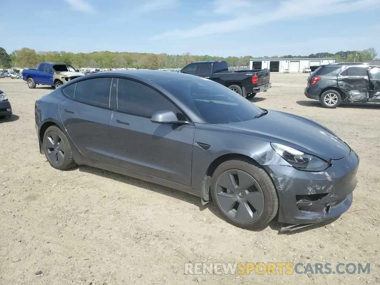 4 Photograph of a damaged car 5YJ3E1EB7NF198115 TESLA MODEL 3 2022