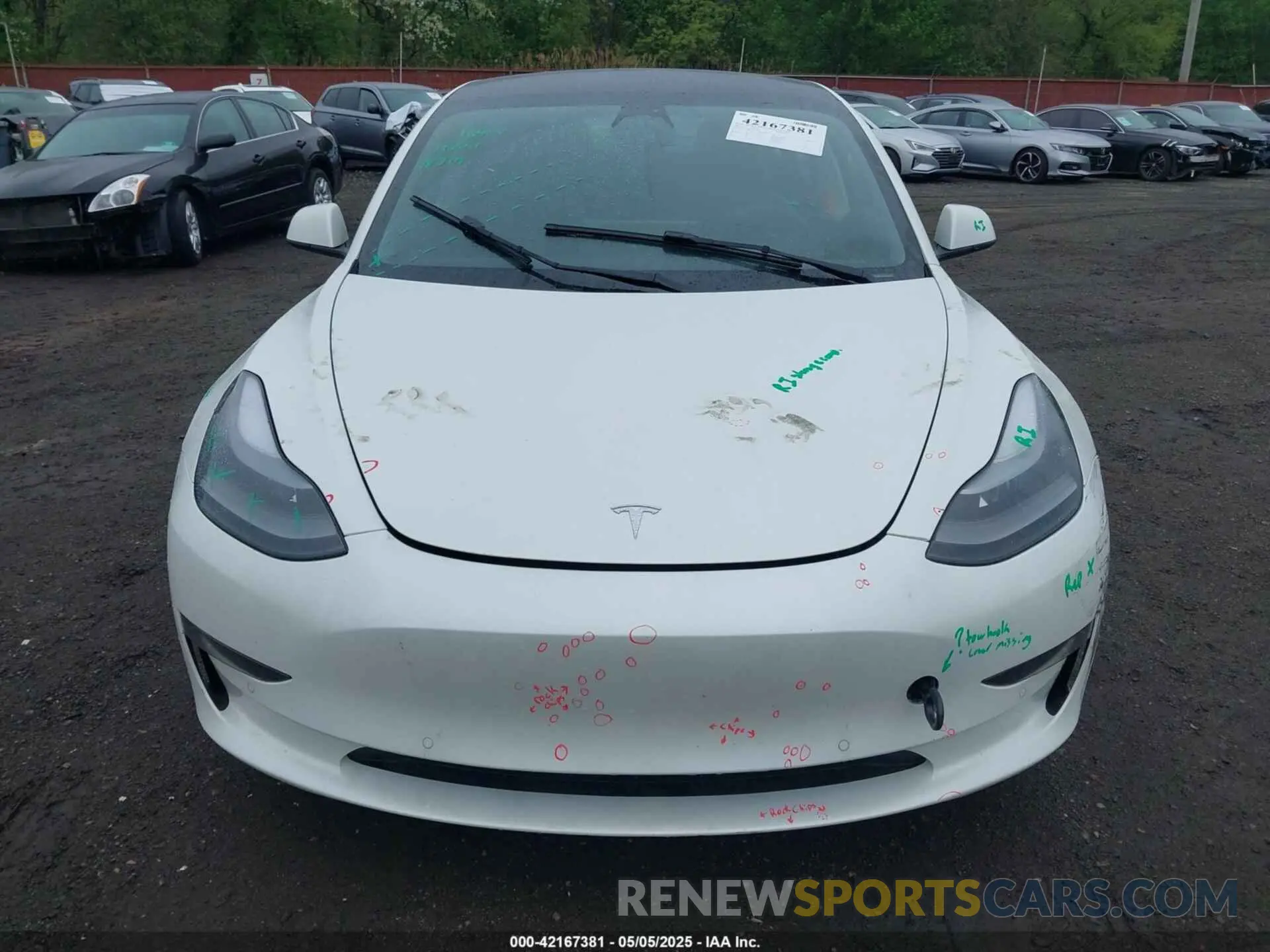 12 Photograph of a damaged car 5YJ3E1EB7NF257440 TESLA MODEL 3 2022