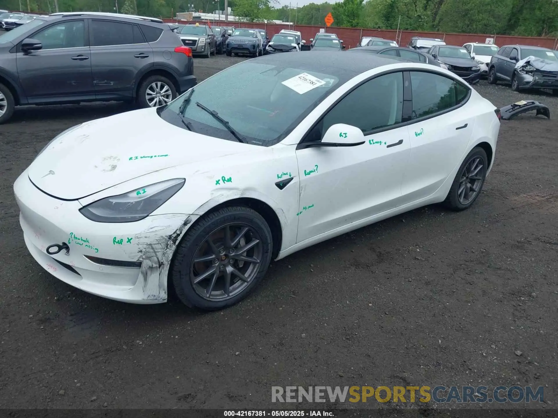 2 Photograph of a damaged car 5YJ3E1EB7NF257440 TESLA MODEL 3 2022