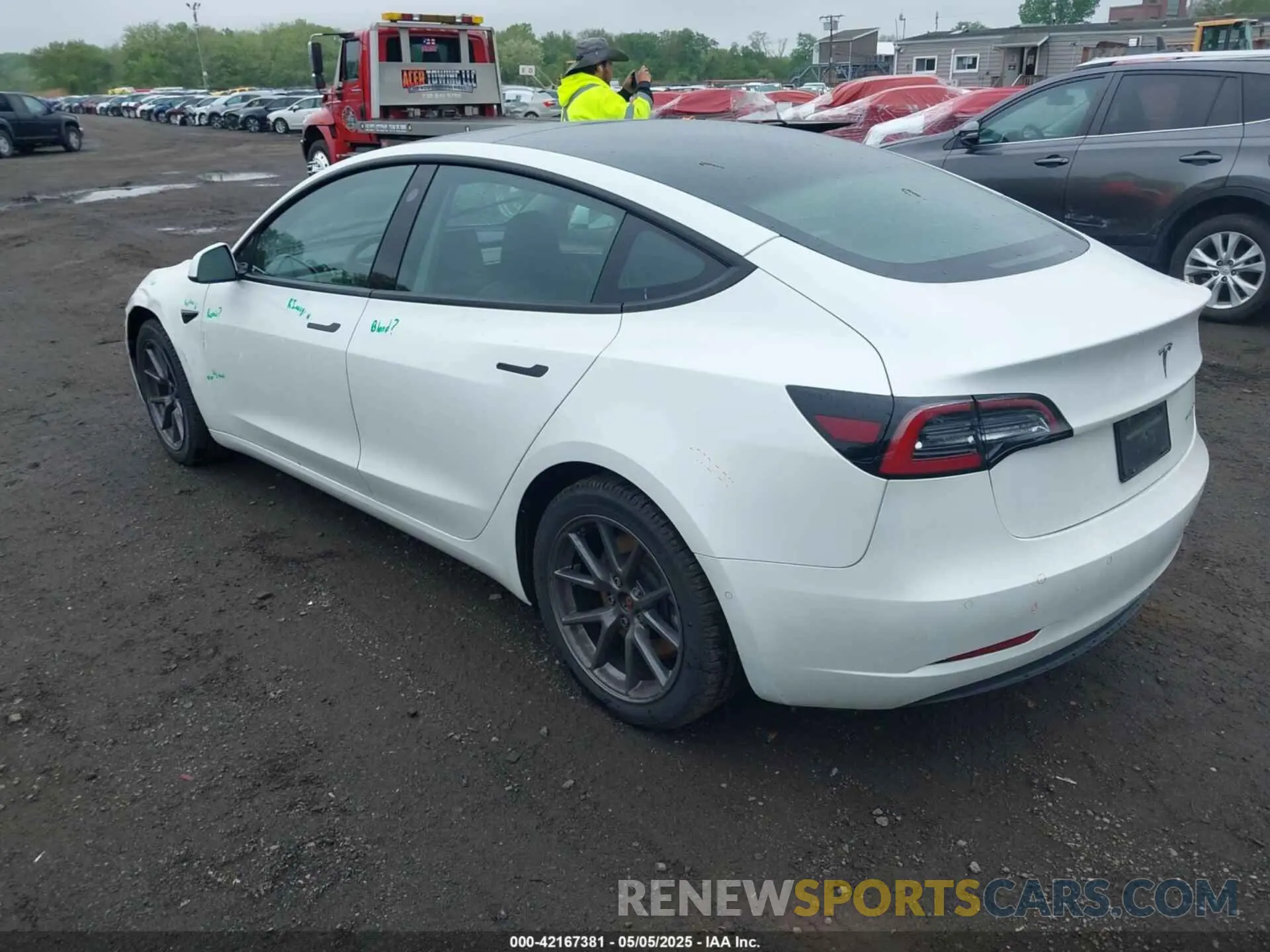 3 Photograph of a damaged car 5YJ3E1EB7NF257440 TESLA MODEL 3 2022