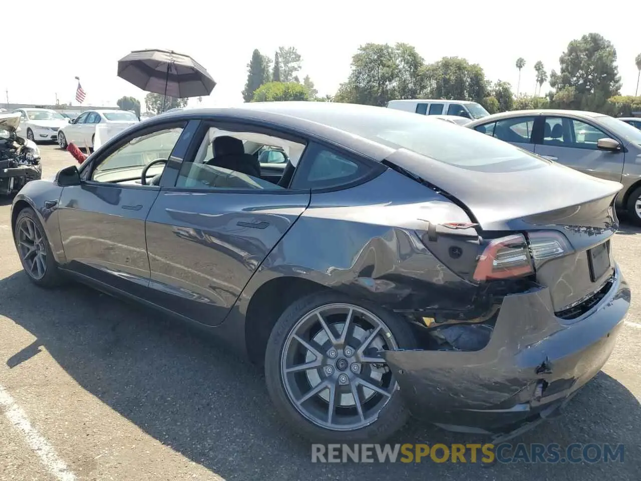 2 Photograph of a damaged car 5YJ3E1EB7NF277493 TESLA MODEL 3 2022