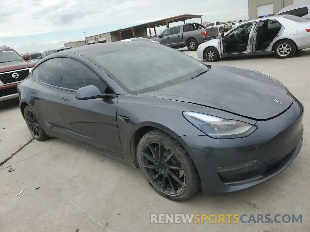 4 Photograph of a damaged car 5YJ3E1EB8NF103965 TESLA MODEL 3 2022
