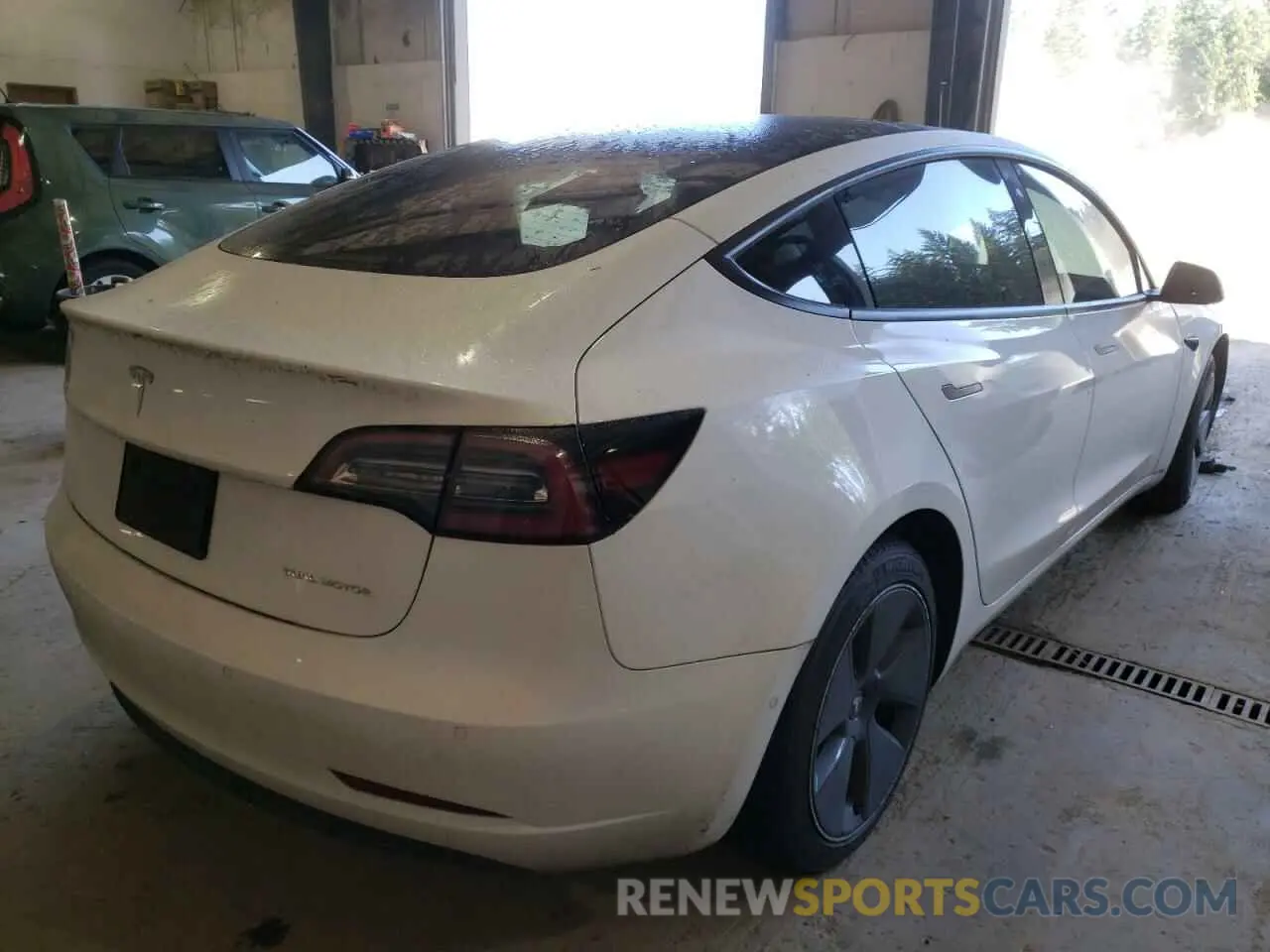 4 Photograph of a damaged car 5YJ3E1EB8NF106820 TESLA MODEL 3 2022