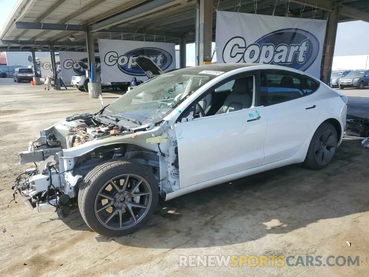 1 Photograph of a damaged car 5YJ3E1EB8NF159369 TESLA MODEL 3 2022
