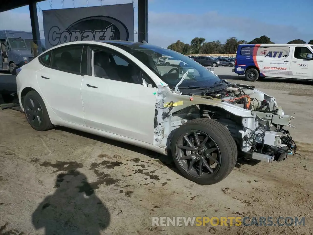 4 Photograph of a damaged car 5YJ3E1EB8NF159369 TESLA MODEL 3 2022