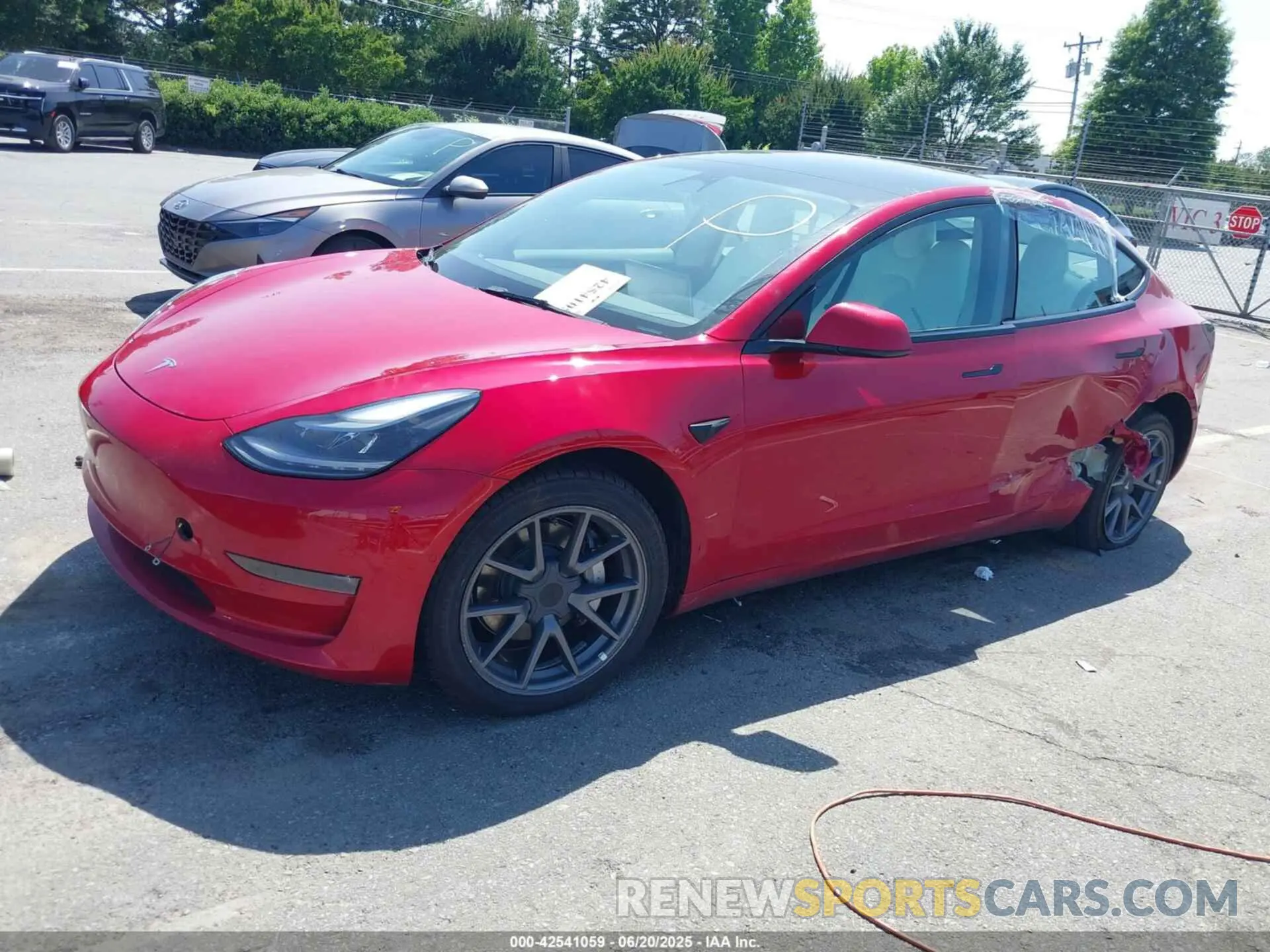 2 Photograph of a damaged car 5YJ3E1EB8NF199712 TESLA MODEL 3 2022