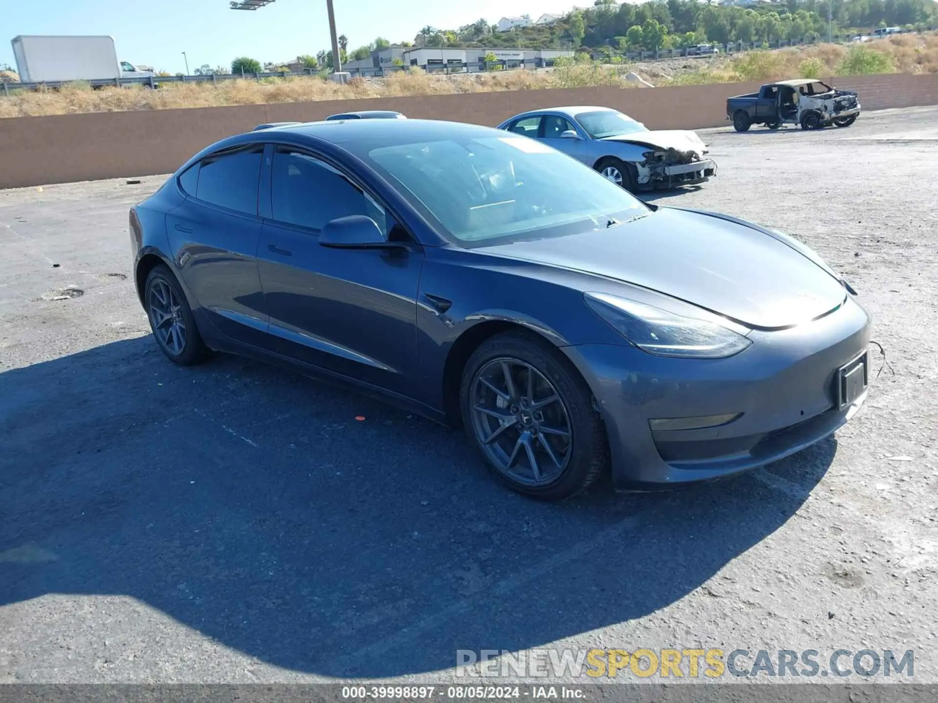 1 Photograph of a damaged car 5YJ3E1EB8NF206593 TESLA MODEL 3 2022