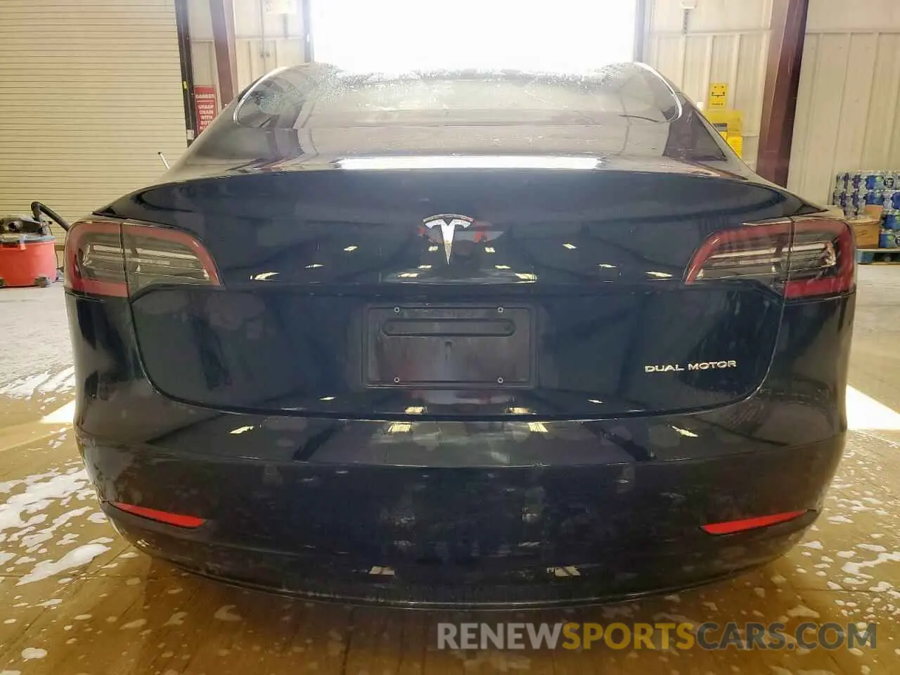 6 Photograph of a damaged car 5YJ3E1EB8NF285716 TESLA MODEL 3 2022