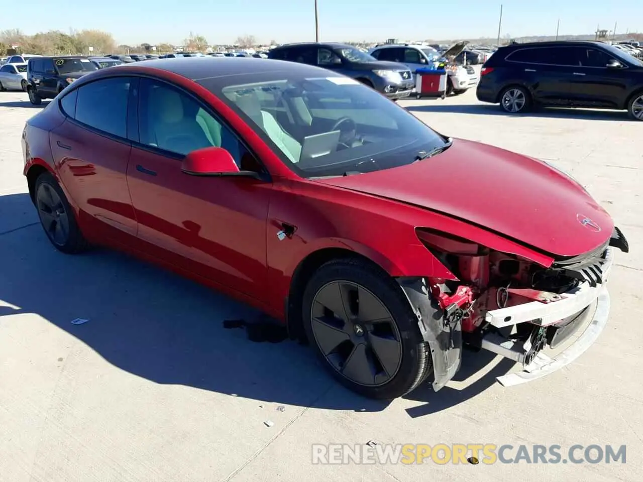 4 Photograph of a damaged car 5YJ3E1EB9NF196401 TESLA MODEL 3 2022