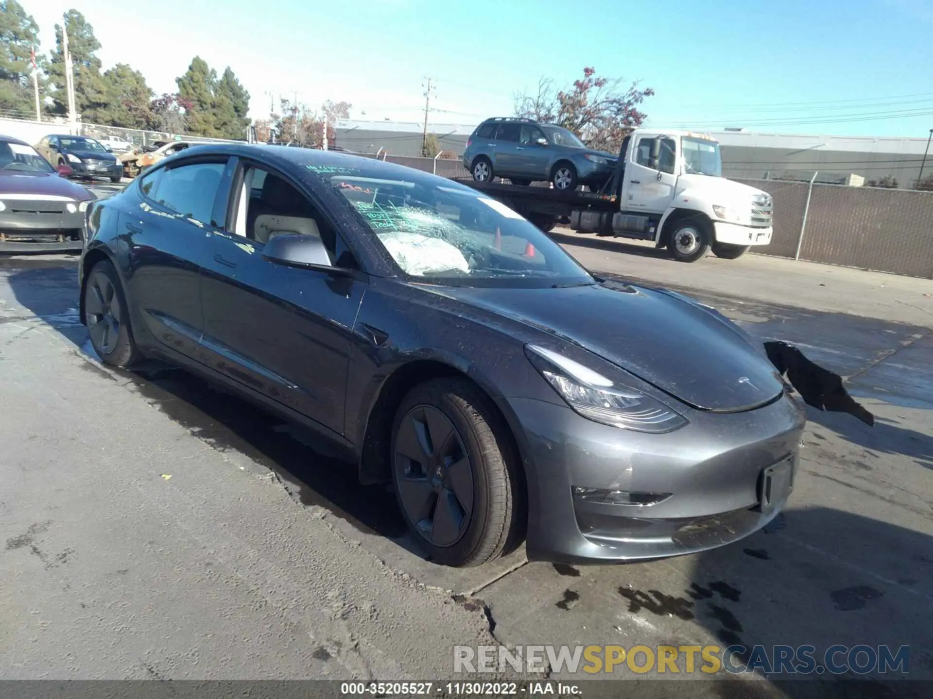 1 Photograph of a damaged car 5YJ3E1EB9NF242535 TESLA MODEL 3 2022