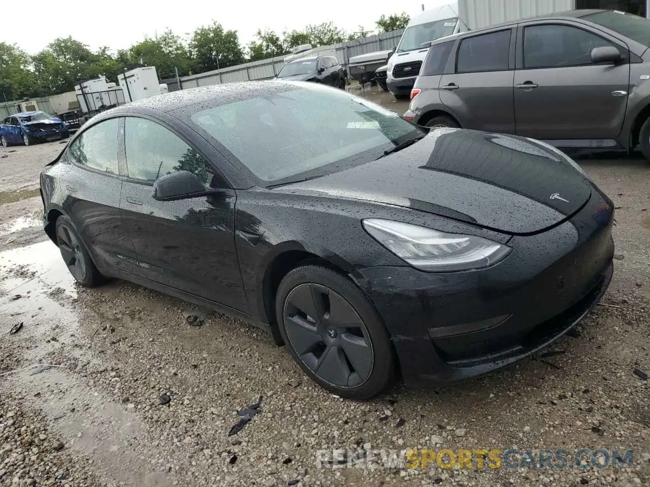 4 Photograph of a damaged car 5YJ3E1EB9NF244527 TESLA MODEL 3 2022