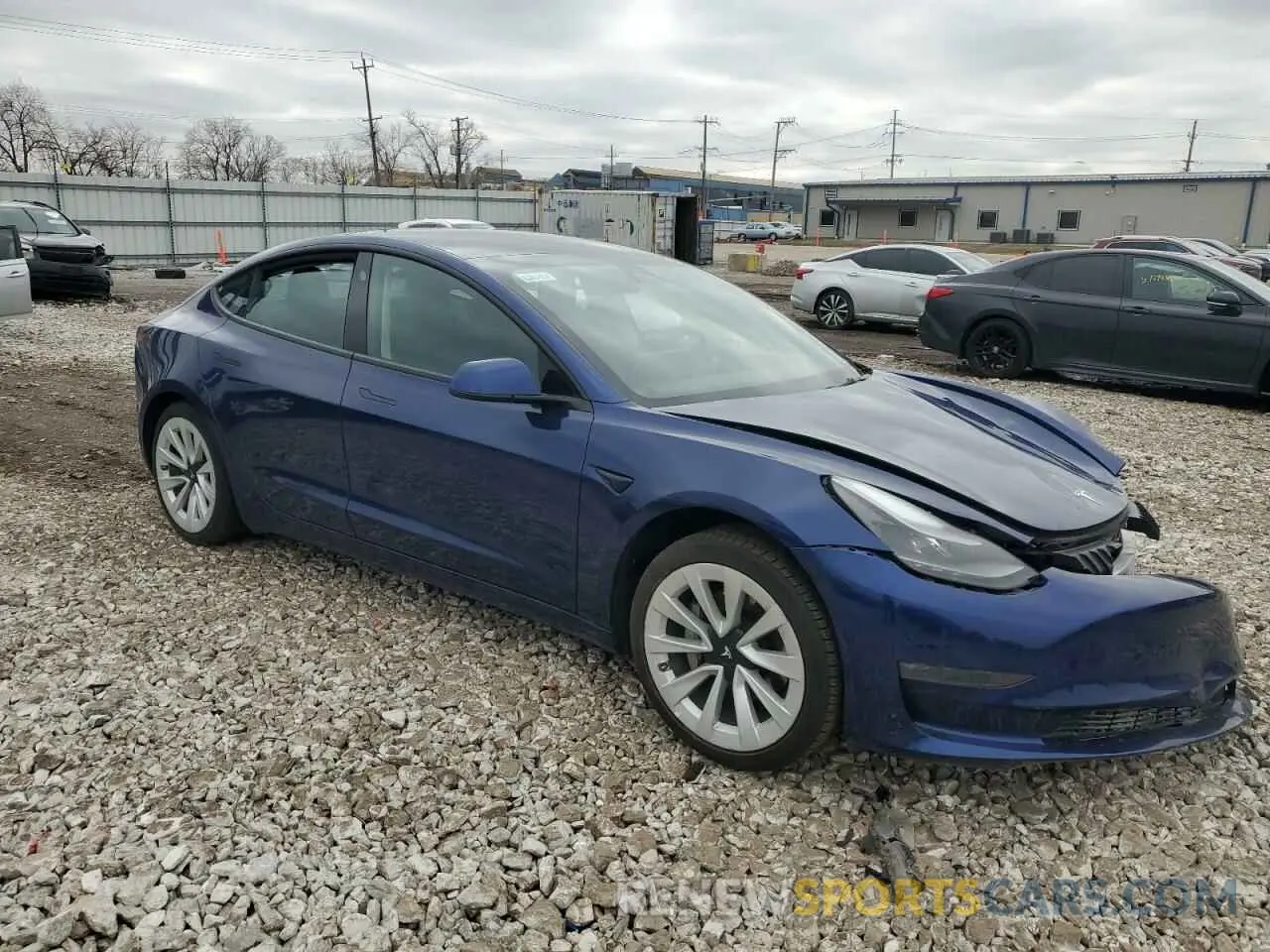 4 Photograph of a damaged car 5YJ3E1EB9NF272070 TESLA MODEL 3 2022