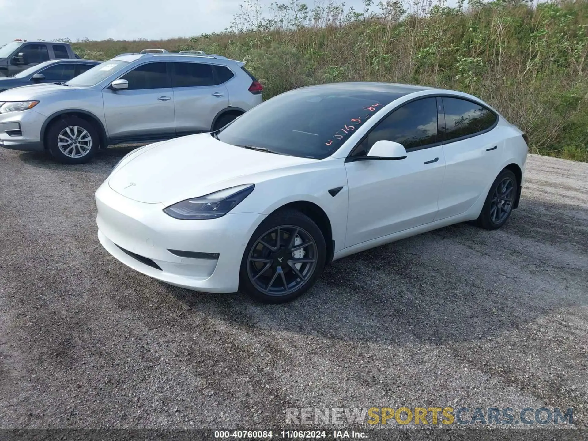 2 Photograph of a damaged car 5YJ3E1EB9NF310011 TESLA MODEL 3 2022