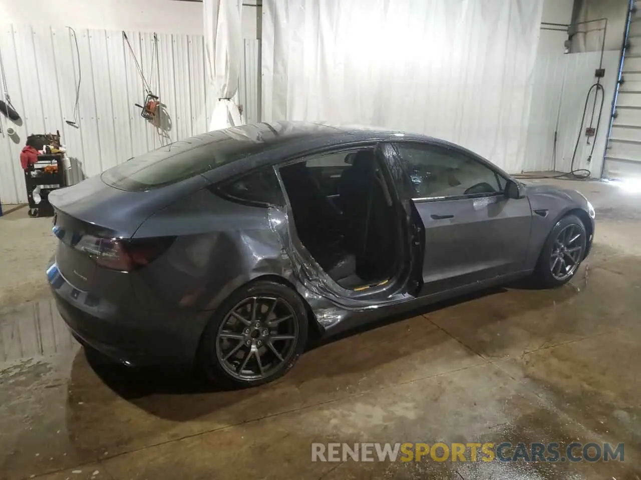 3 Photograph of a damaged car 5YJ3E1EB9NF335622 TESLA MODEL 3 2022