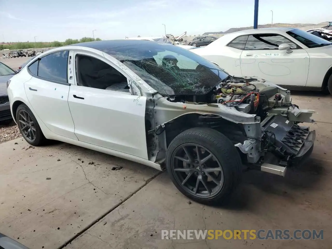4 Photograph of a damaged car 5YJ3E1EB9NF350010 TESLA MODEL 3 2022