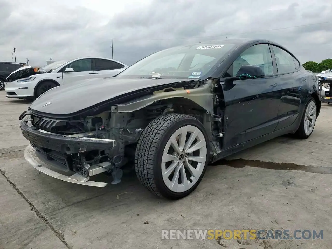 1 Photograph of a damaged car 5YJ3E1EB9NF354607 TESLA MODEL 3 2022