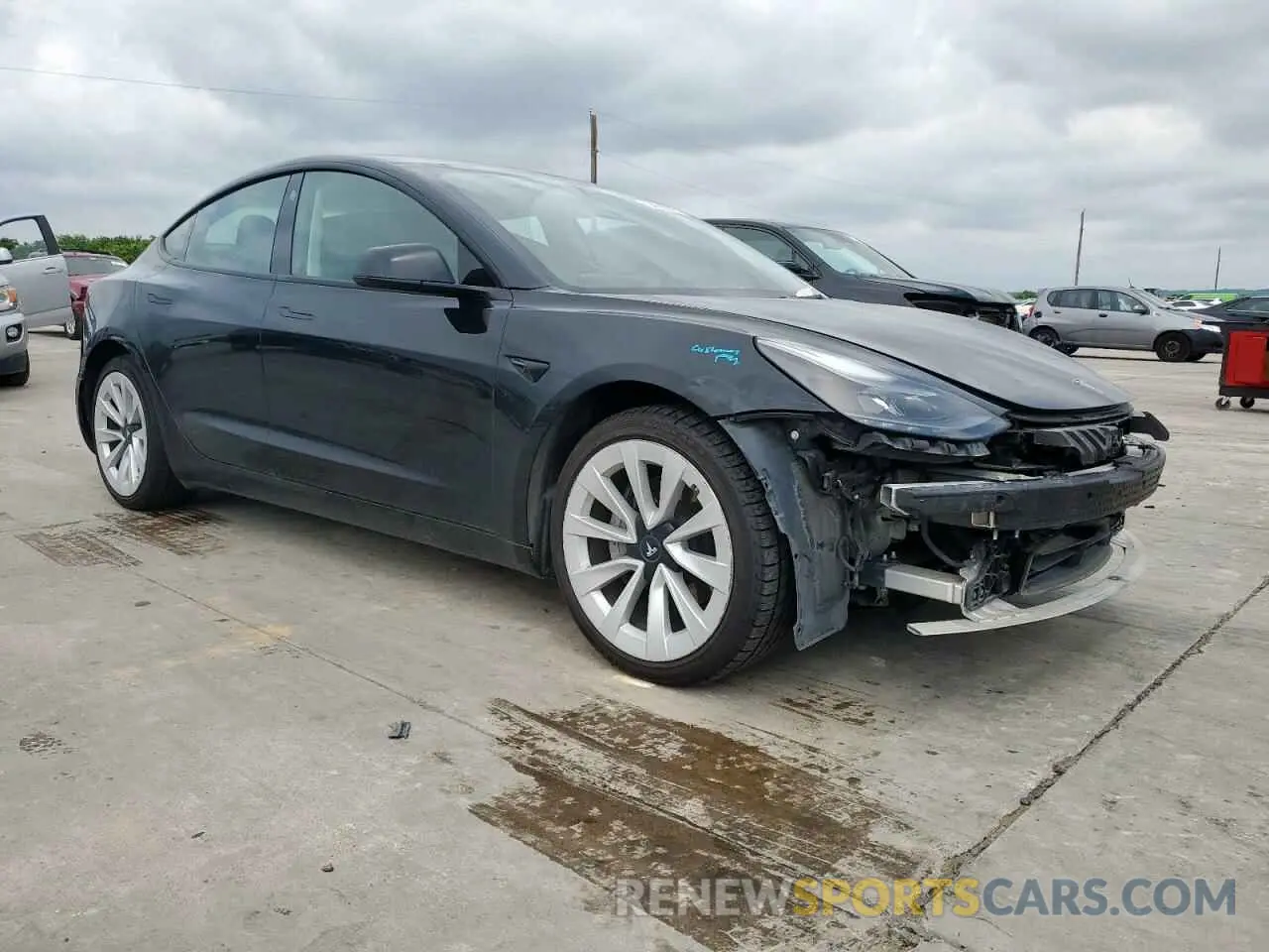 4 Photograph of a damaged car 5YJ3E1EB9NF354607 TESLA MODEL 3 2022