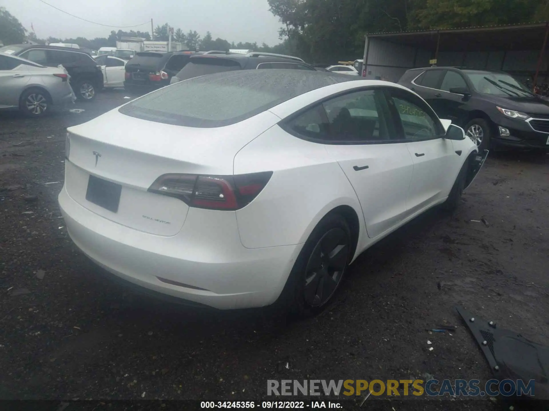 4 Photograph of a damaged car 5YJ3E1EBXNF101134 TESLA MODEL 3 2022
