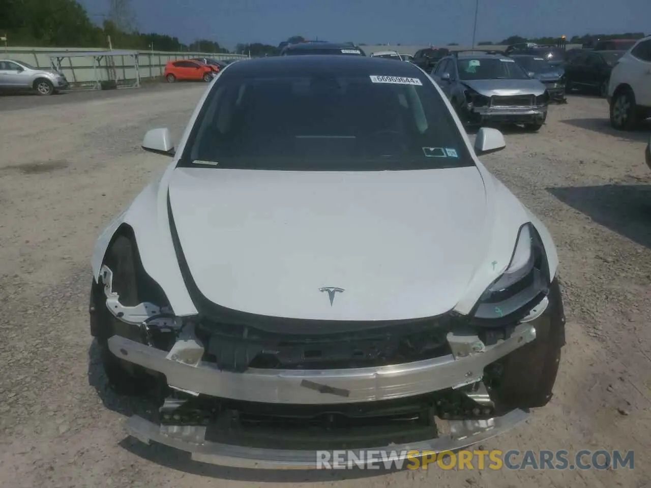 5 Фотография поврежденного автомобиля 5YJ3E1EBXNF106883 TESLA MODEL 3 2022