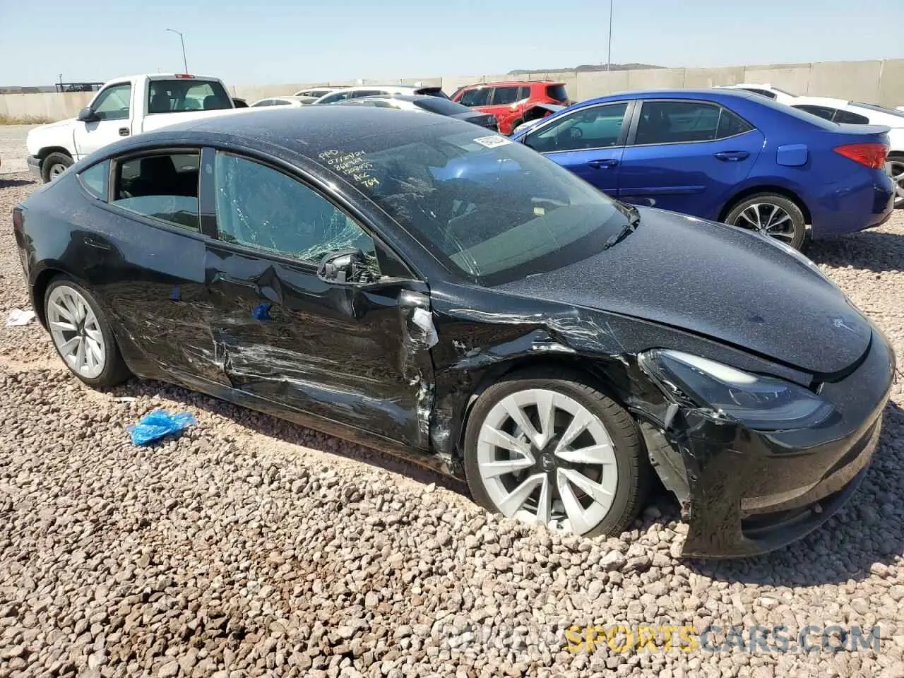 4 Photograph of a damaged car 5YJ3E1EBXNF127250 TESLA MODEL 3 2022