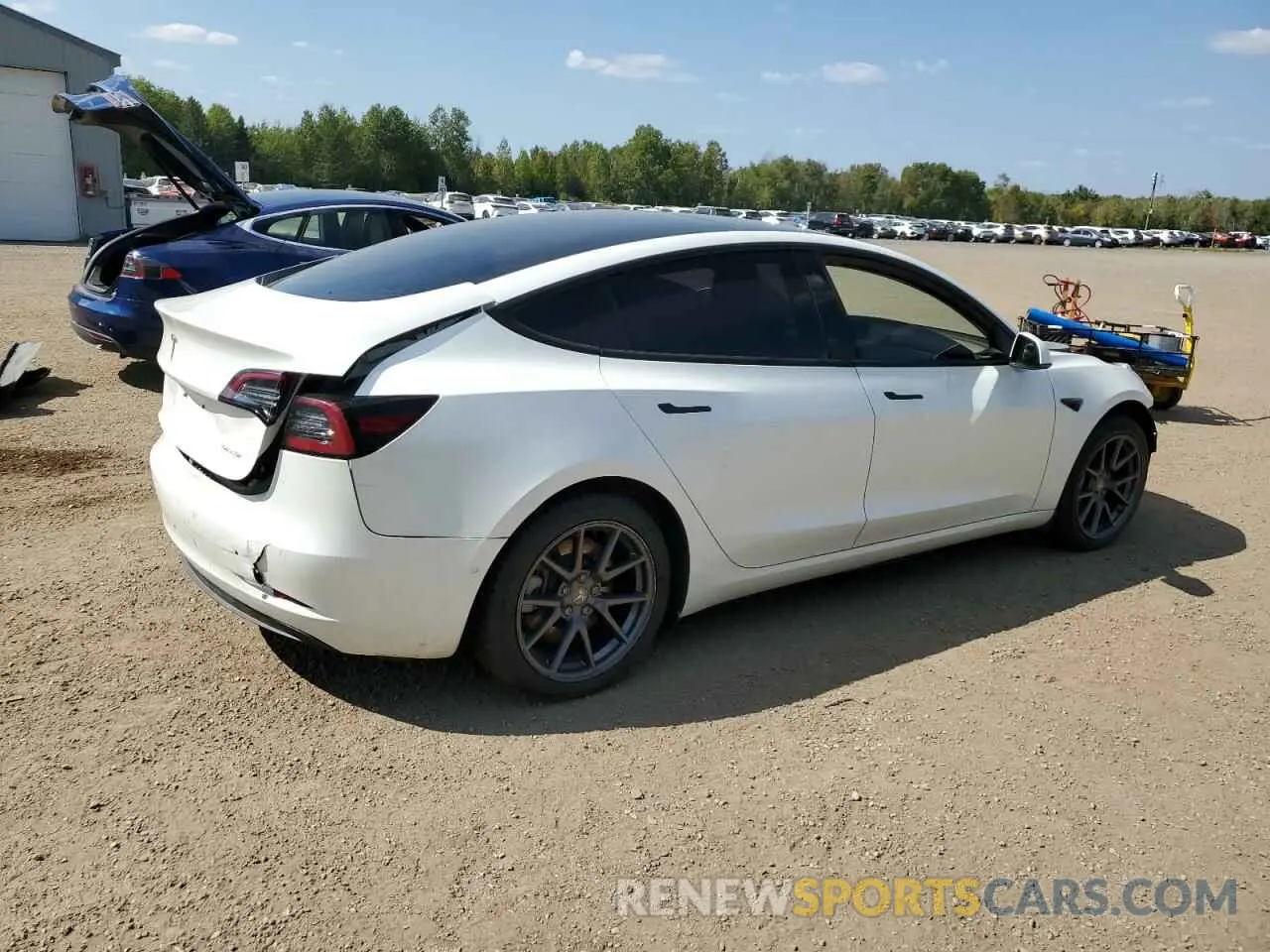 3 Photograph of a damaged car 5YJ3E1EBXNF193443 TESLA MODEL 3 2022