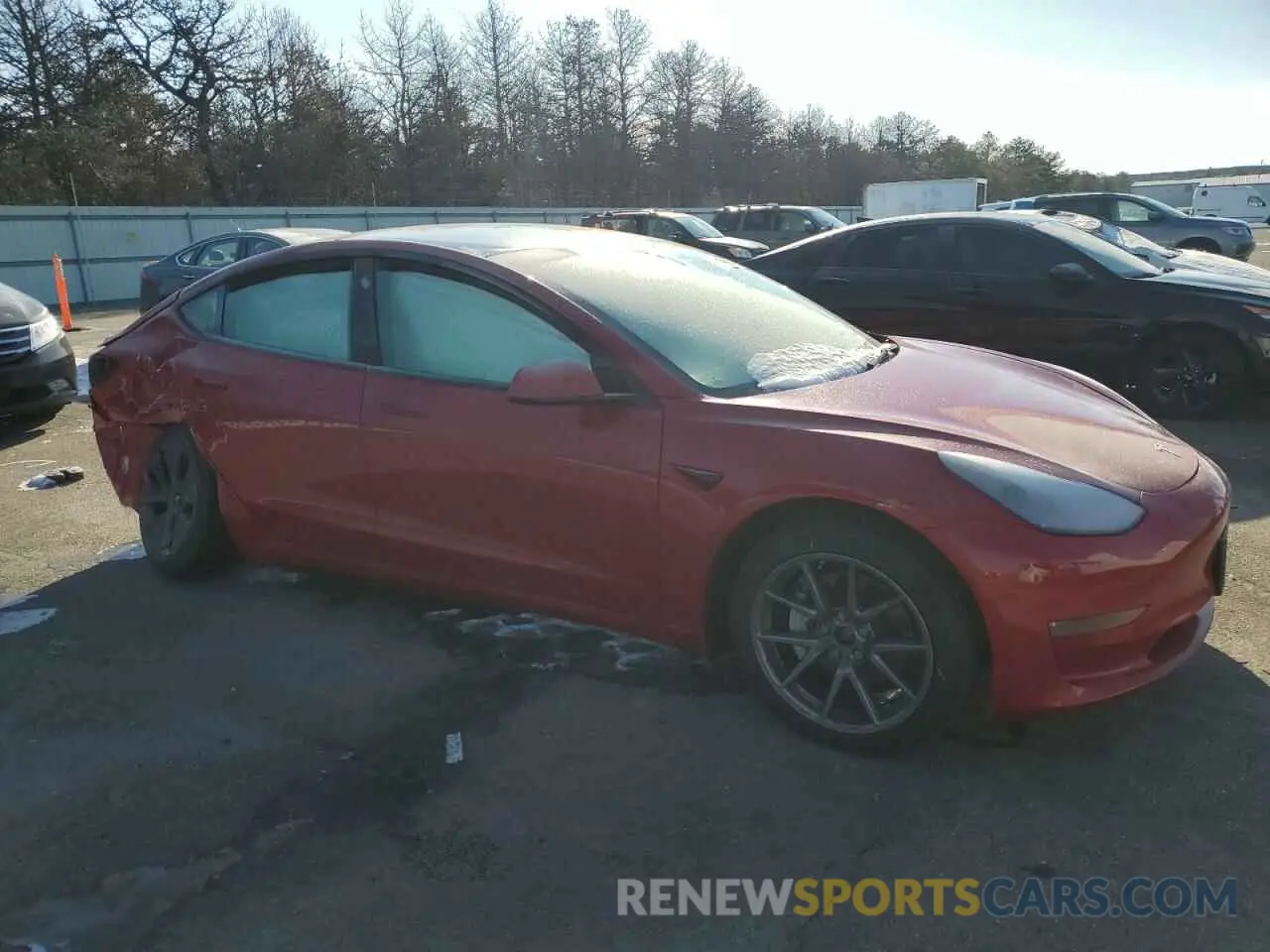 4 Photograph of a damaged car 5YJ3E1EBXNF193765 TESLA MODEL 3 2022
