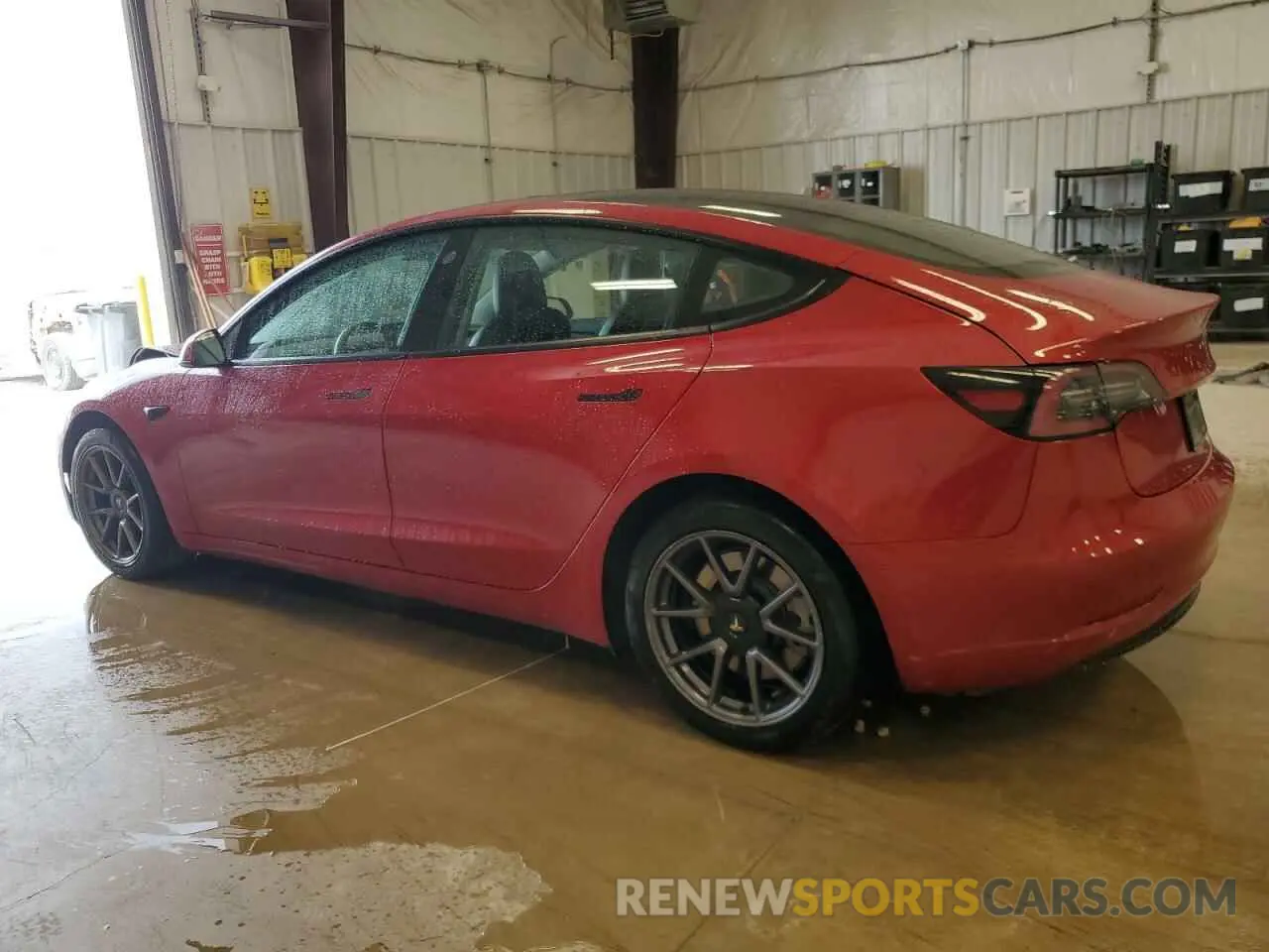 2 Photograph of a damaged car 5YJ3E1EBXNF285779 TESLA MODEL 3 2022