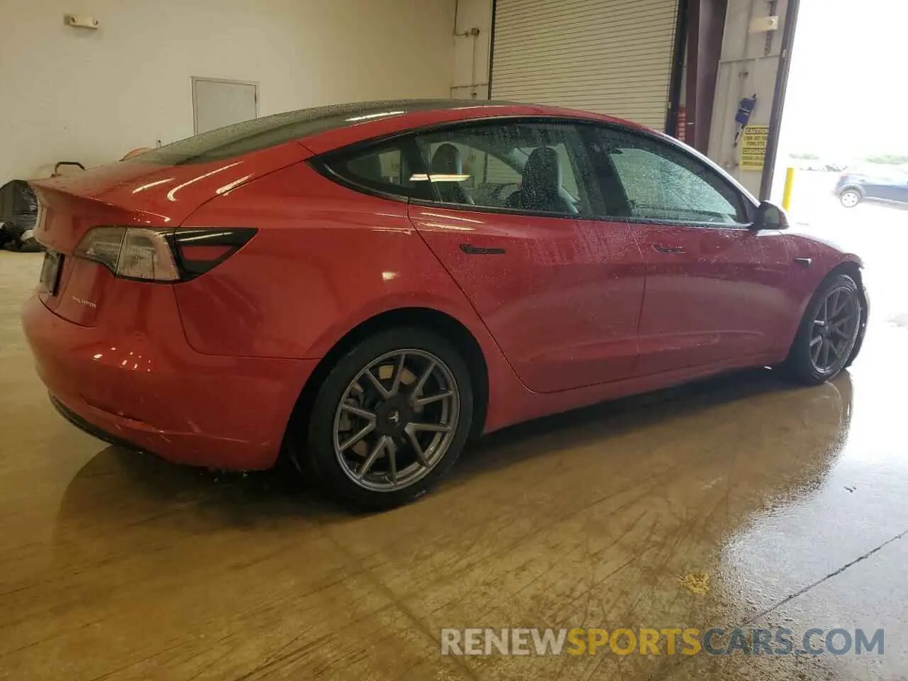 3 Photograph of a damaged car 5YJ3E1EBXNF285779 TESLA MODEL 3 2022
