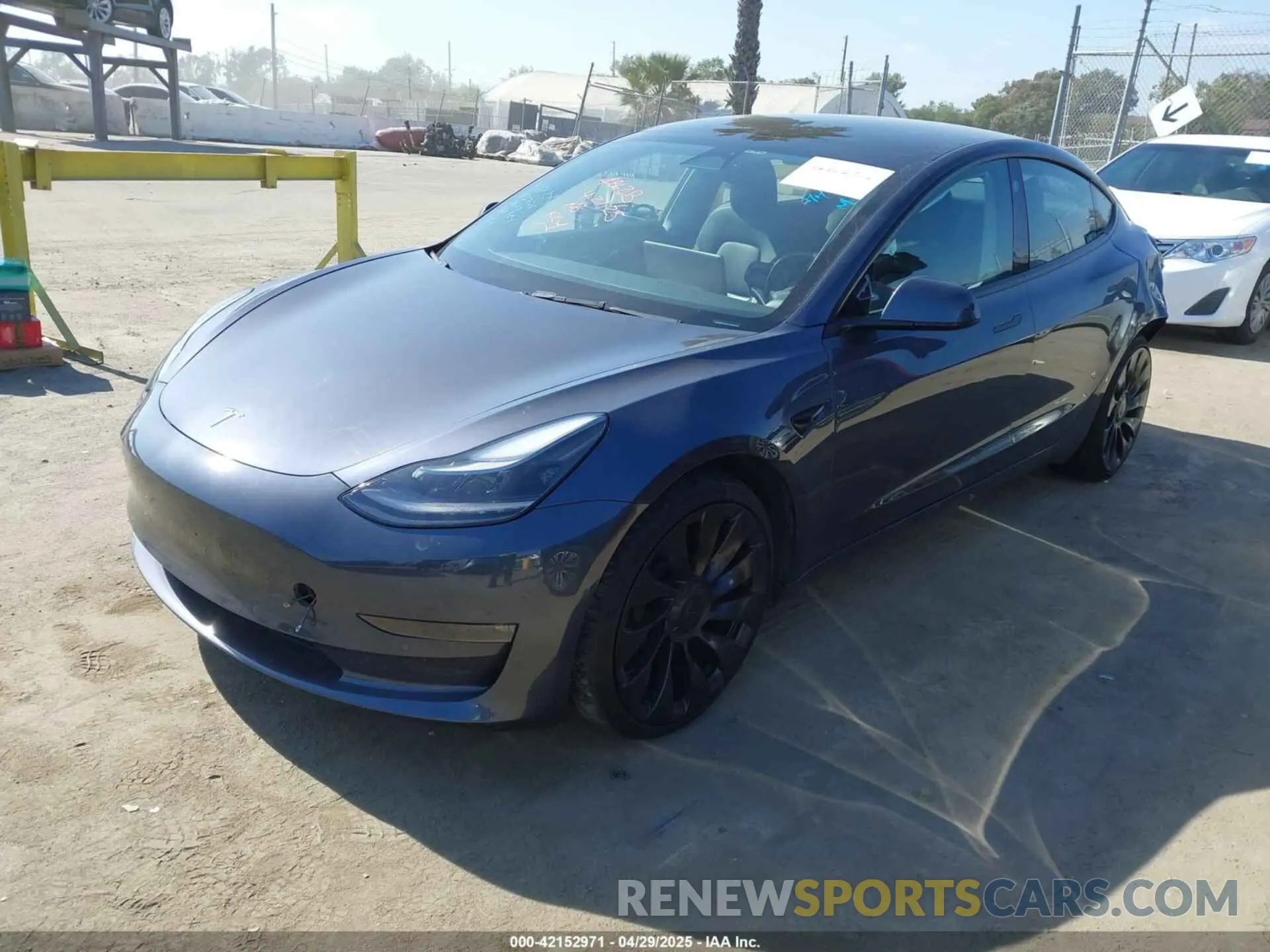 2 Photograph of a damaged car 5YJ3E1EC0NF270037 TESLA MODEL 3 2022