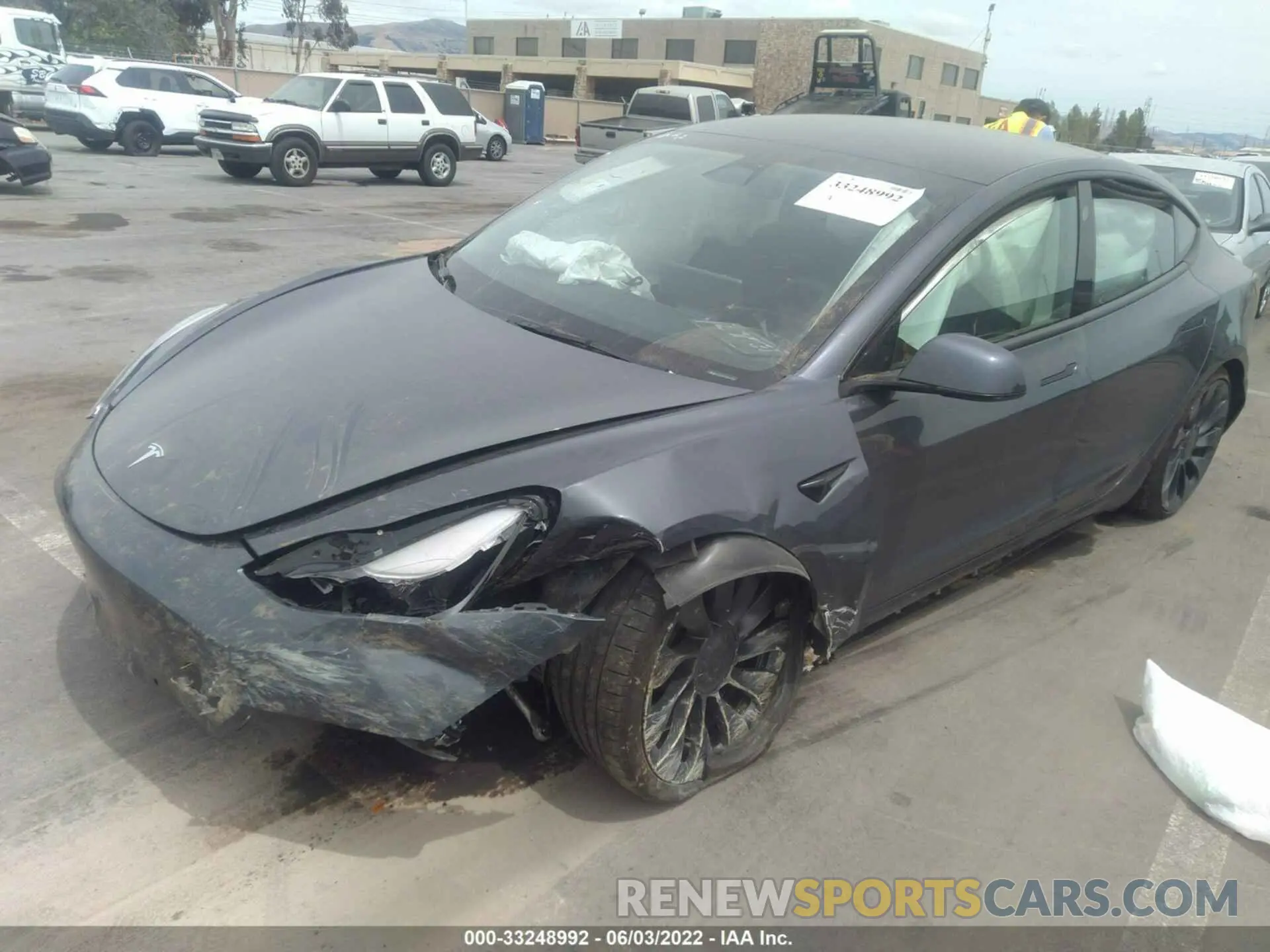 2 Photograph of a damaged car 5YJ3E1EC2NF132337 TESLA MODEL 3 2022