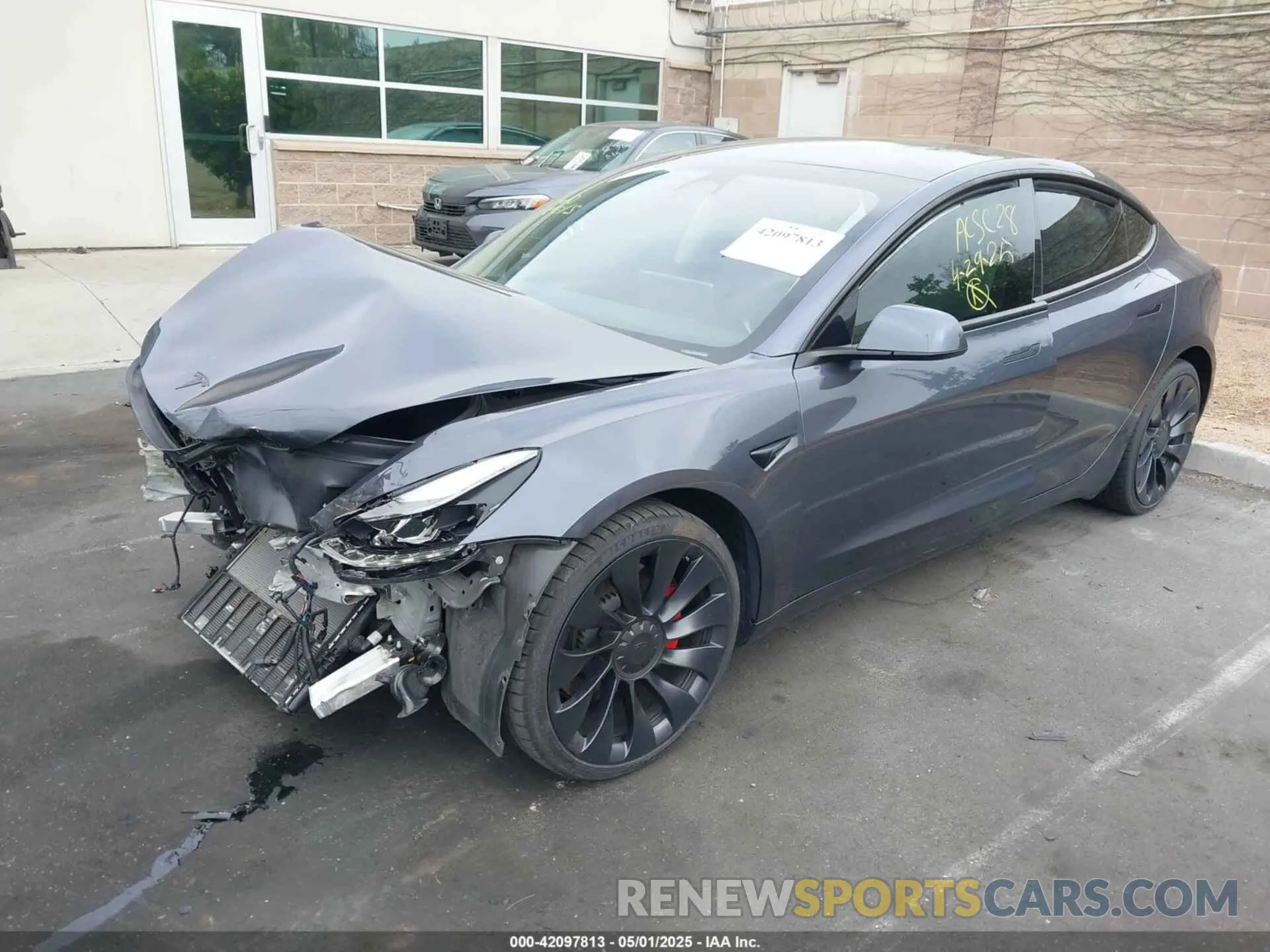 2 Photograph of a damaged car 5YJ3E1EC4NF258974 TESLA MODEL 3 2022