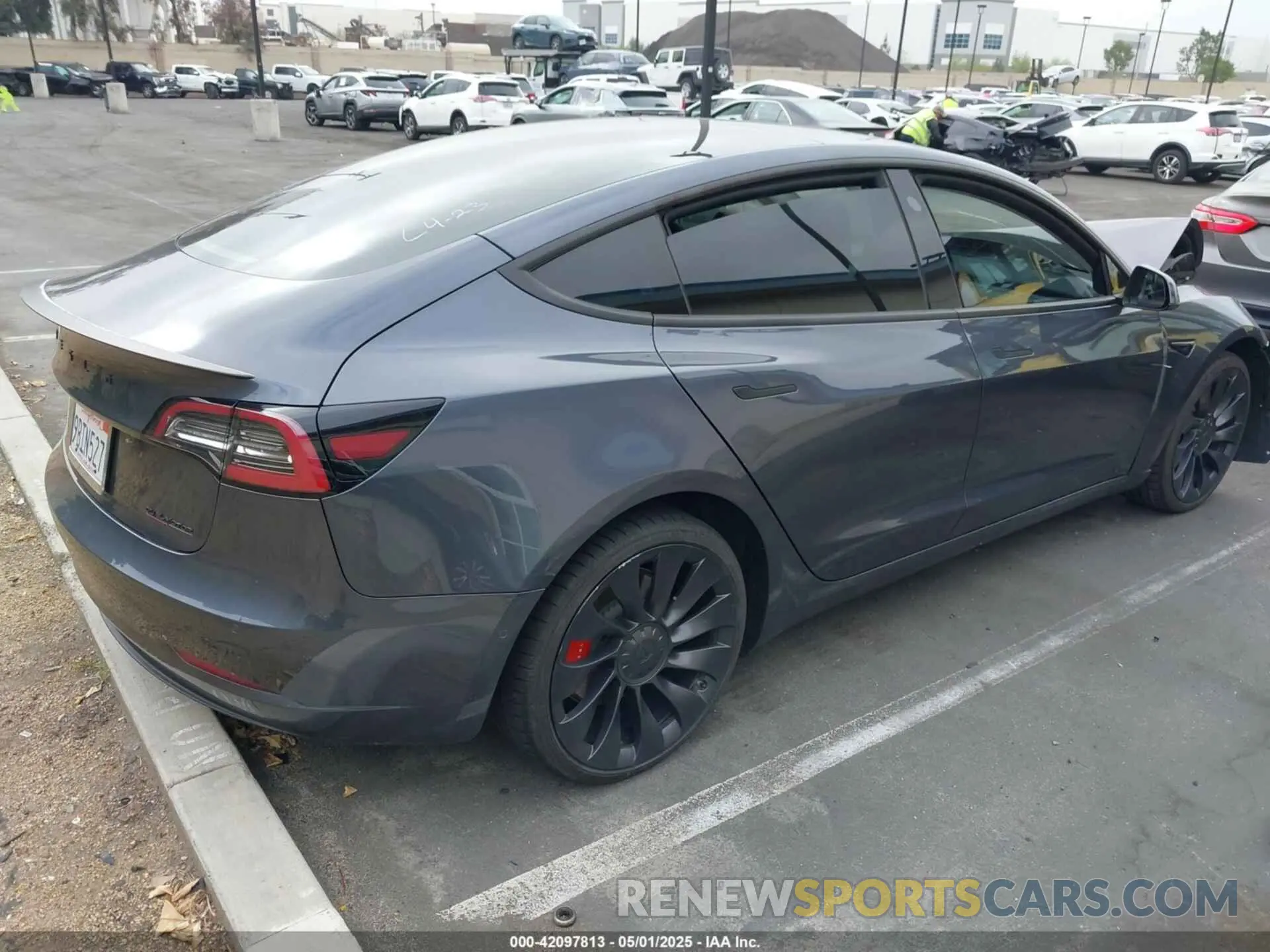 4 Photograph of a damaged car 5YJ3E1EC4NF258974 TESLA MODEL 3 2022