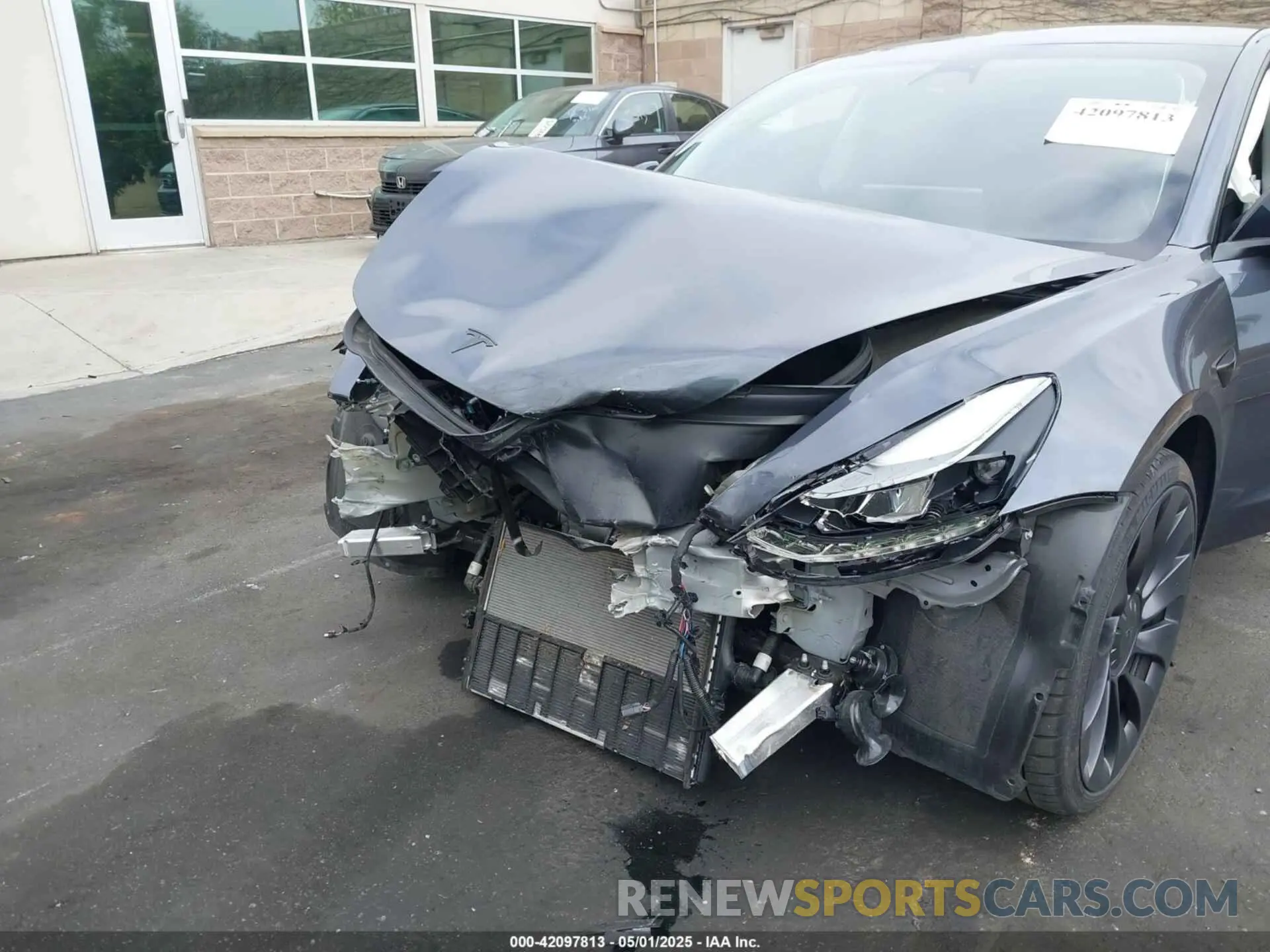 6 Photograph of a damaged car 5YJ3E1EC4NF258974 TESLA MODEL 3 2022