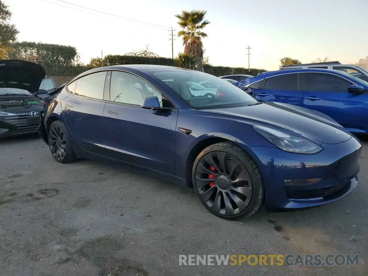 4 Photograph of a damaged car 5YJ3E1EC5NF159709 TESLA MODEL 3 2022