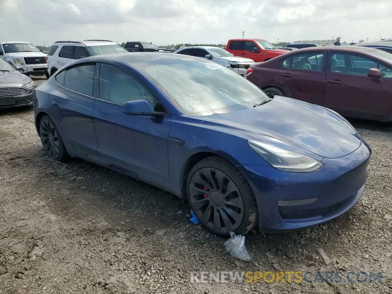 4 Photograph of a damaged car 5YJ3E1EC5NF298108 TESLA MODEL 3 2022