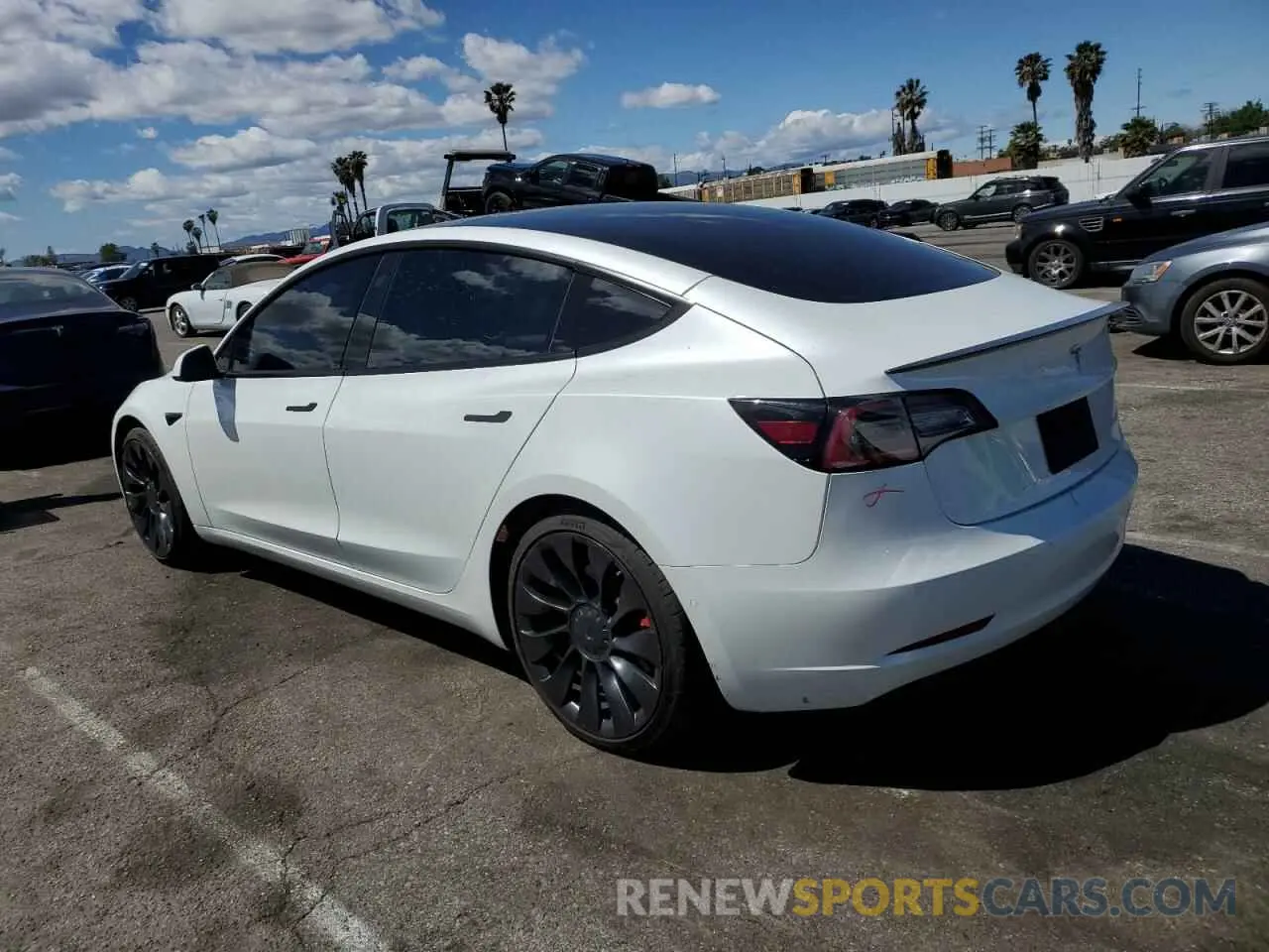 2 Photograph of a damaged car 5YJ3E1EC7NF248083 TESLA MODEL 3 2022