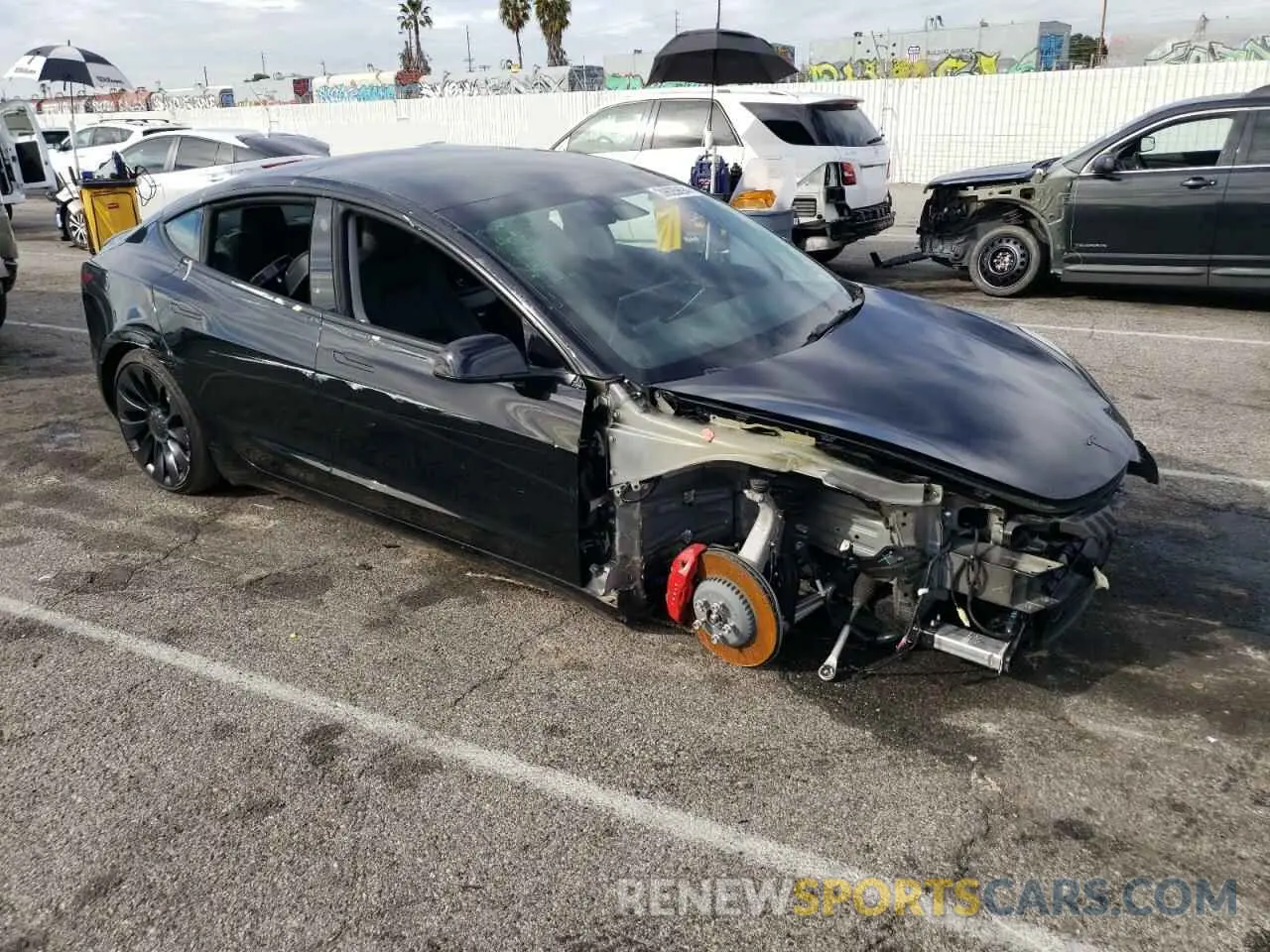 4 Photograph of a damaged car 5YJ3E1EC7NF277227 TESLA MODEL 3 2022