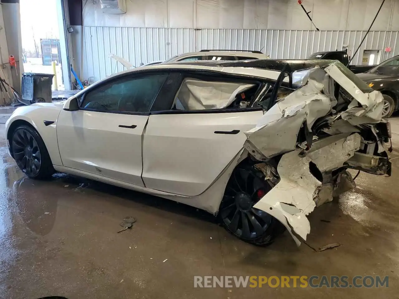 2 Фотография поврежденного автомобиля 5YJ3E1EC8NF200530 TESLA MODEL 3 2022