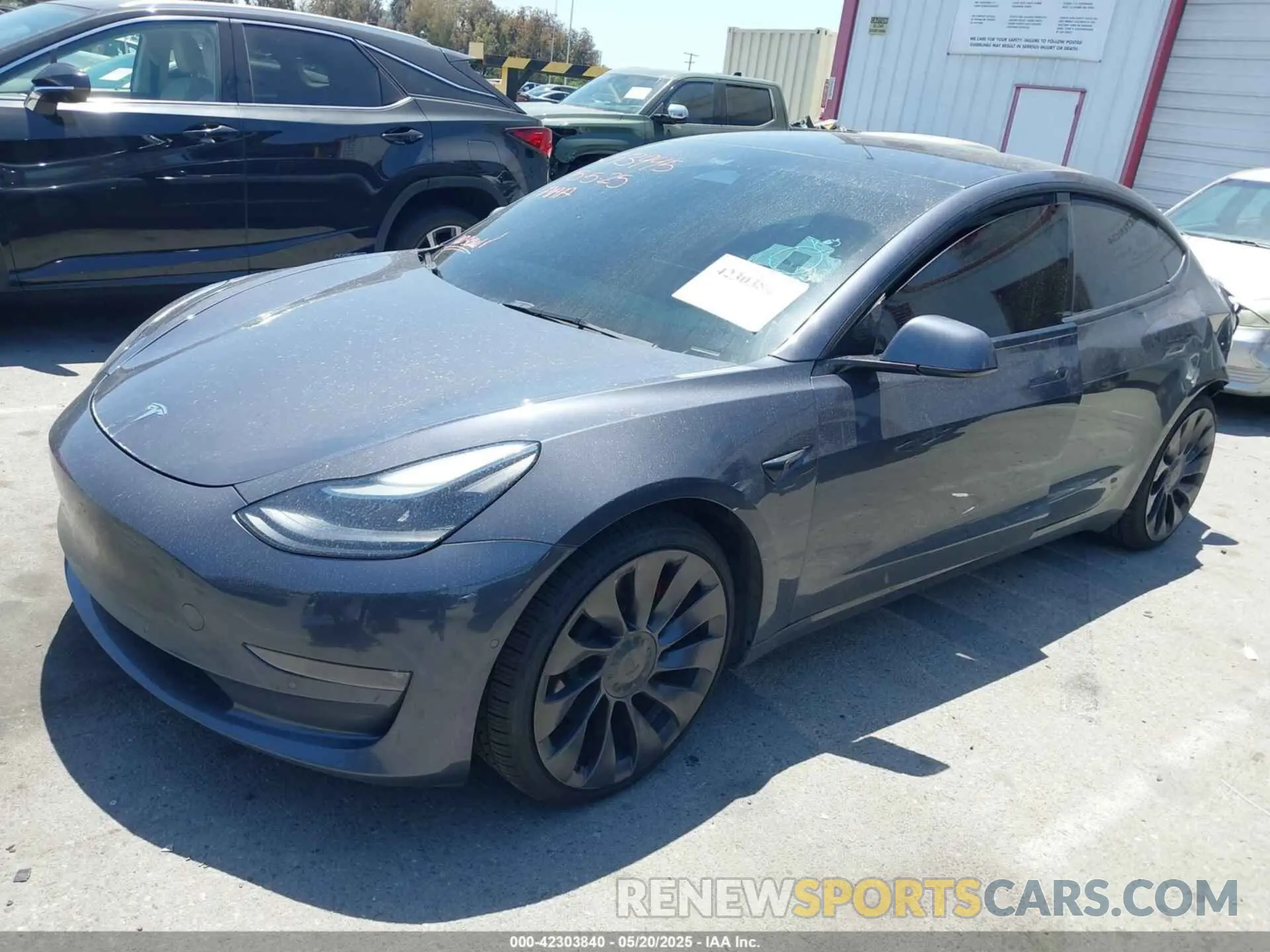 2 Photograph of a damaged car 5YJ3E1EC9NF210936 TESLA MODEL 3 2022