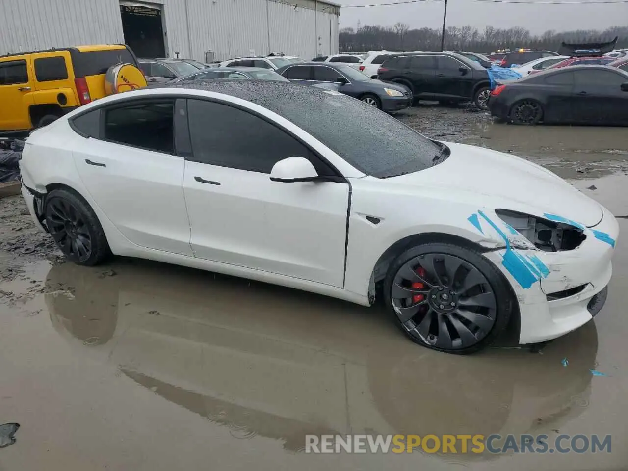 4 Photograph of a damaged car 5YJ3E1EC9NF335824 TESLA MODEL 3 2022