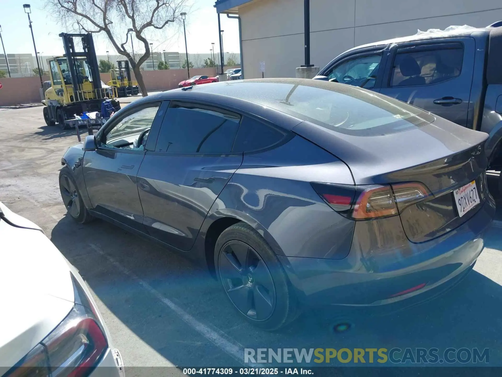 13 Photograph of a damaged car 5YJ3E1EA0PF408774 TESLA MODEL 3 2023