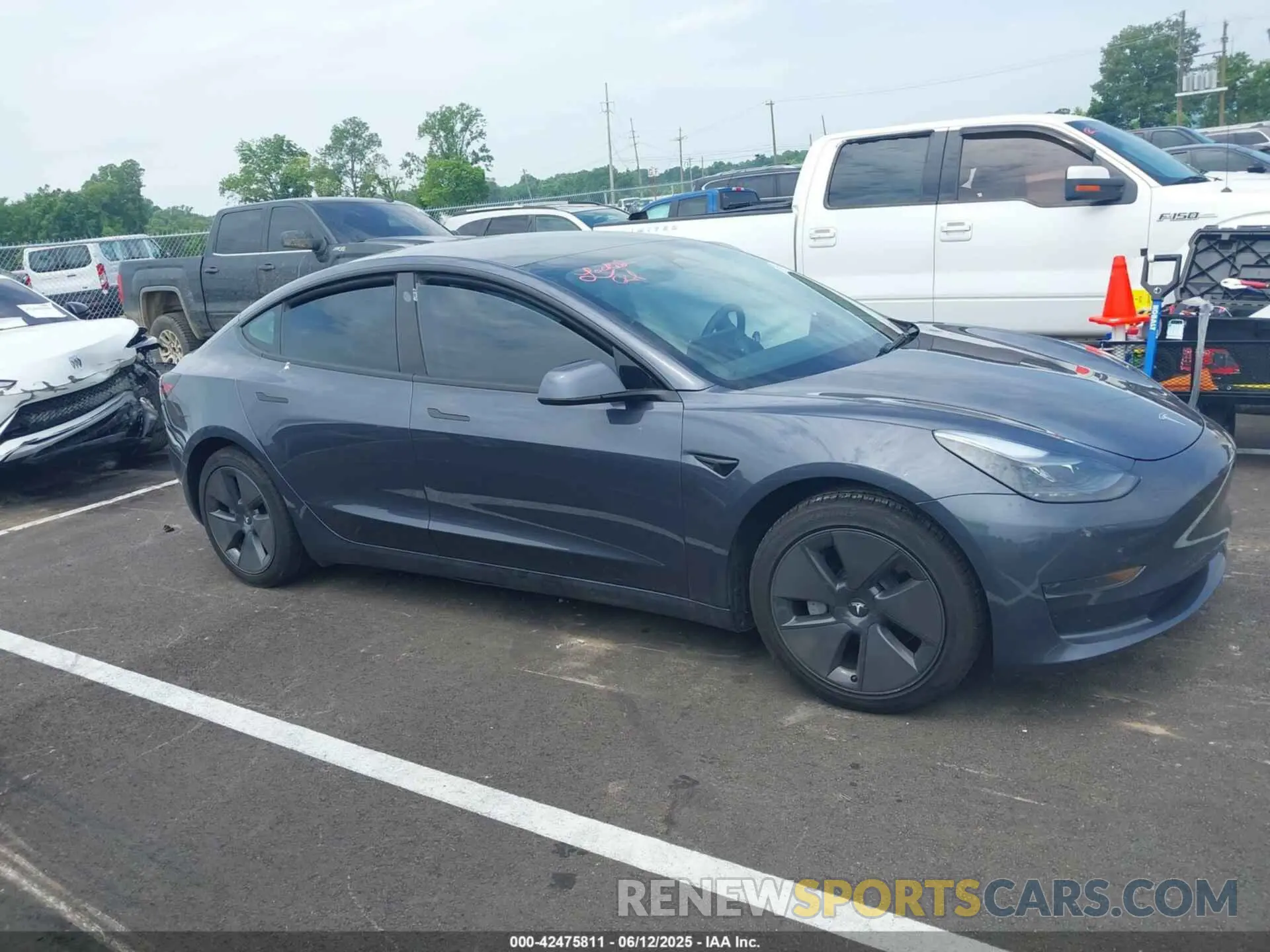 12 Photograph of a damaged car 5YJ3E1EA0PF495110 TESLA MODEL 3 2023