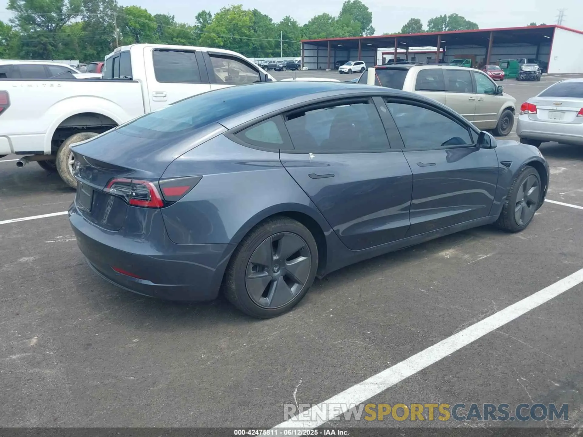 4 Photograph of a damaged car 5YJ3E1EA0PF495110 TESLA MODEL 3 2023
