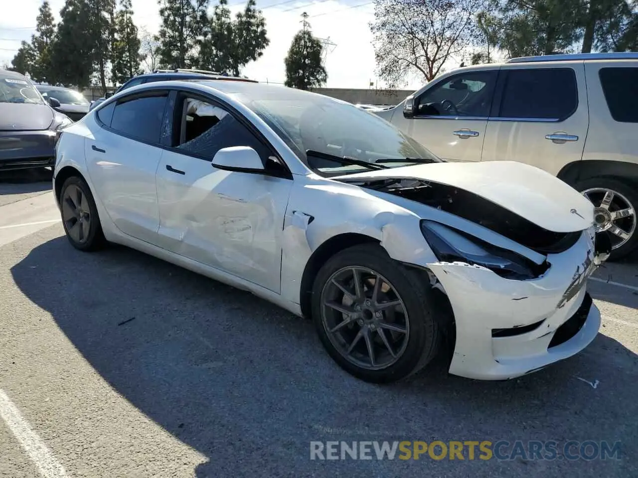 4 Photograph of a damaged car 5YJ3E1EA0PF549490 TESLA MODEL 3 2023