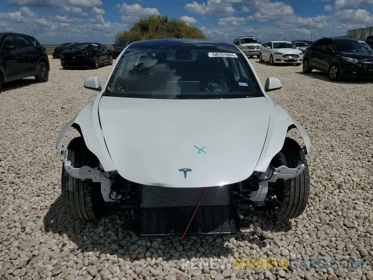 5 Photograph of a damaged car 5YJ3E1EA0PF701915 TESLA MODEL 3 2023