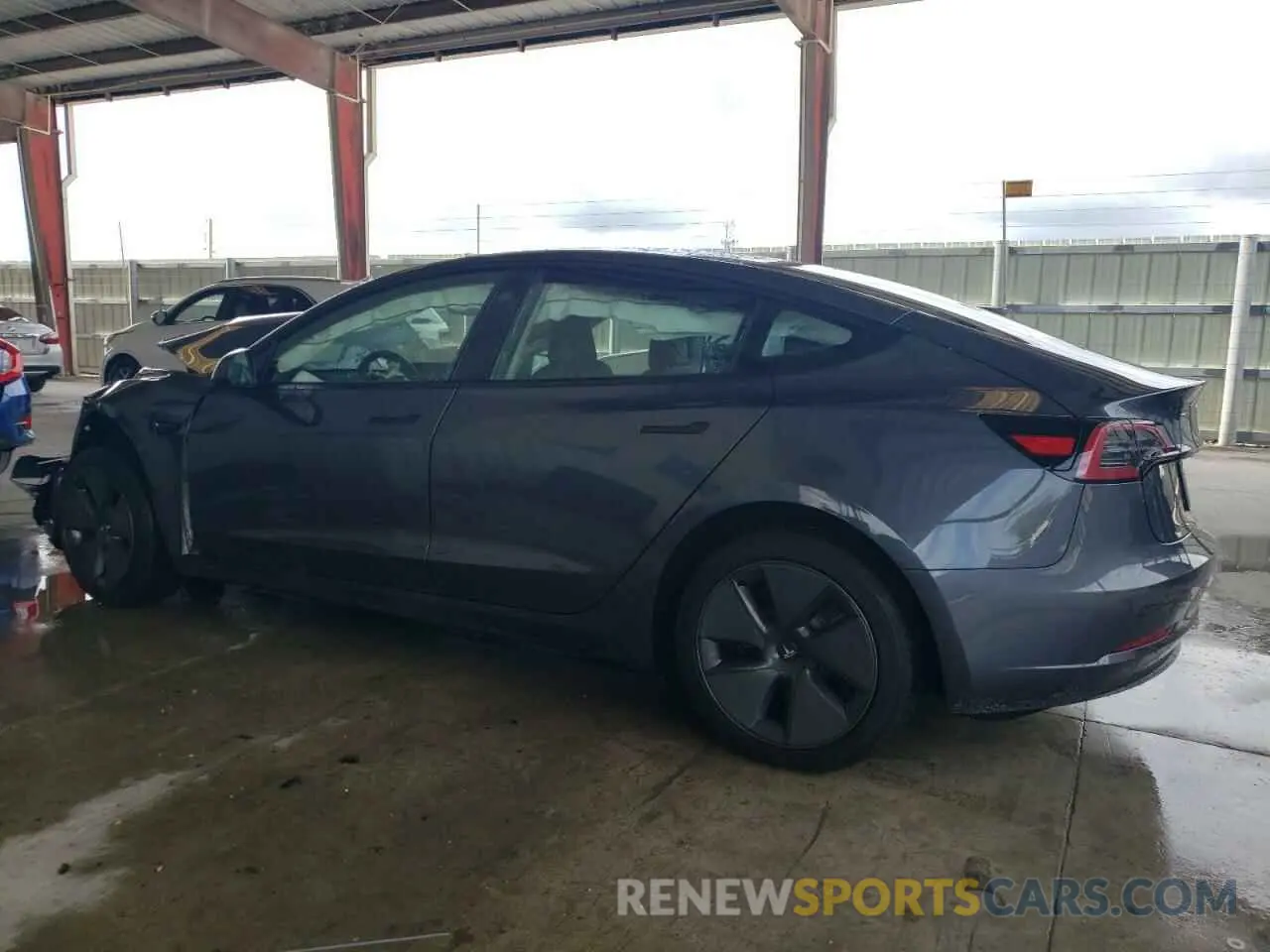 2 Photograph of a damaged car 5YJ3E1EA0PF705219 TESLA MODEL 3 2023